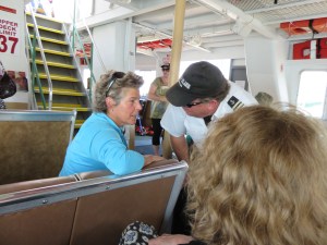 Tia Nelson talks with Captain Sherman